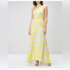 New with tag attached Stunning Coctail/evening dress with slit in front .